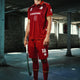 Men's red Belgium football shorts with number 18 print and sponsor details