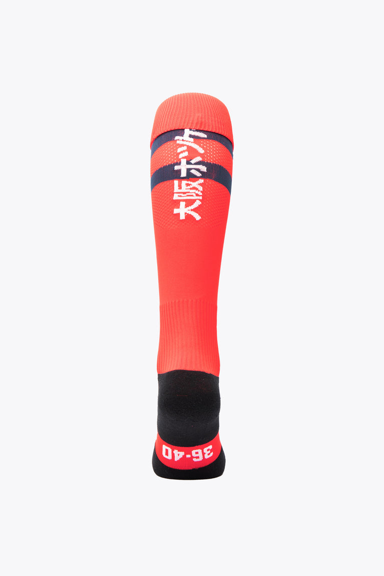 KHC Brugge Field Hockey Socks in red and navy with Osaka logo in green. Back view
