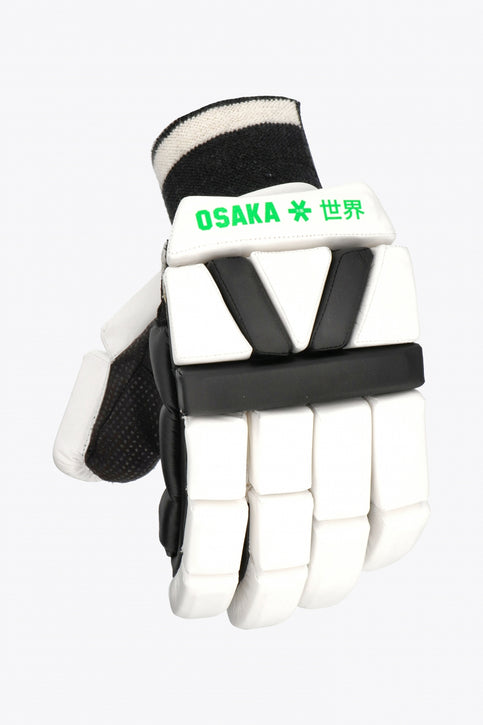 Osaka indoor glove white and black with green logo. top view