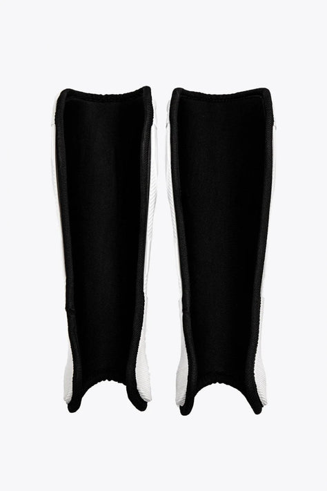 Osaka Hockey Shinguard | White-Black Osaka Shinguard white and black with logo. Front view