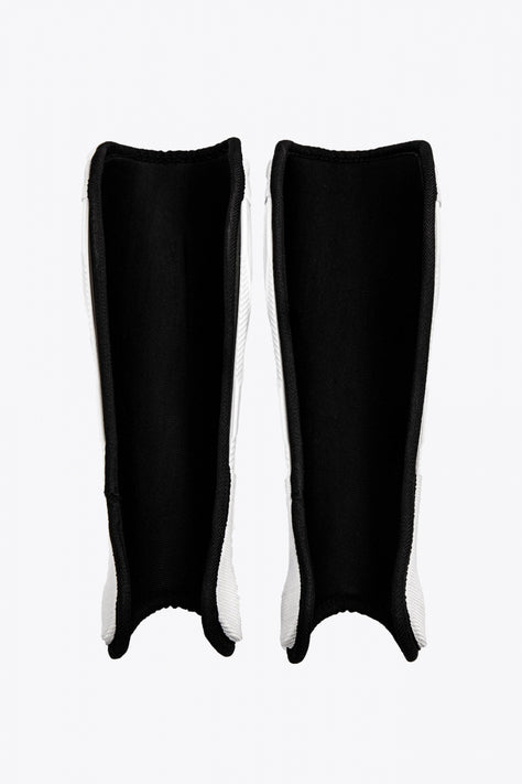 Osaka Hockey Shinguard | White-Black Osaka Shinguard white and black with logo. Front view