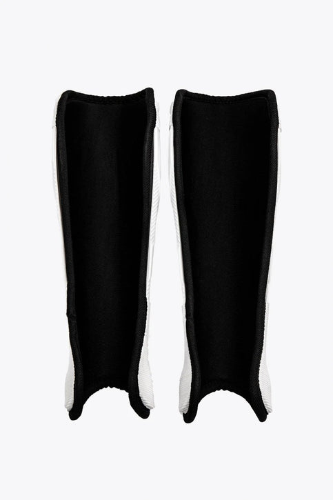Osaka Hockey Shinguard | White-Black Osaka Shinguard white and black with logo. Front view
