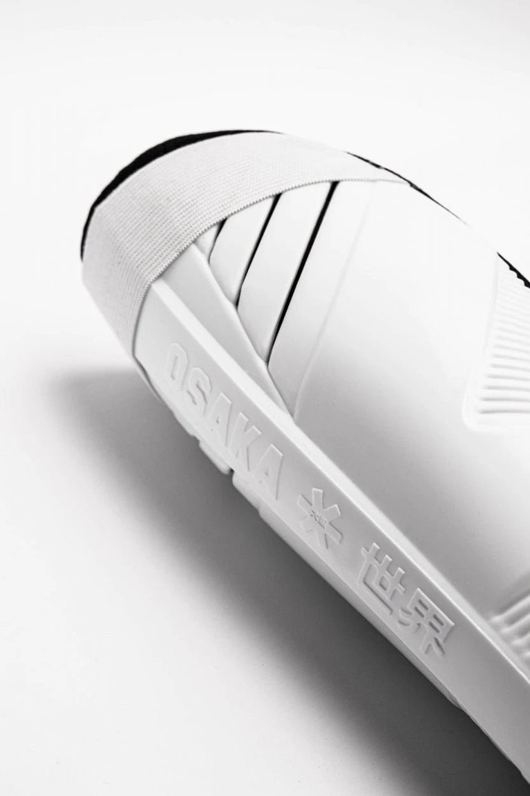 Osaka Shinguard white and black with logo. Close view
