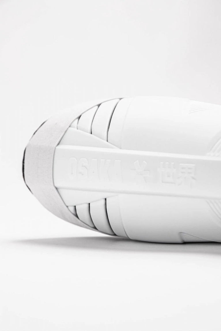 Osaka Shinguard white and black with logo. Logo view