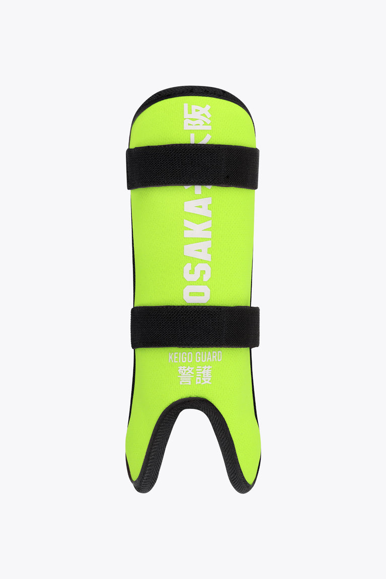 Kids lime green shin guard with black straps and visible OSAKA logo