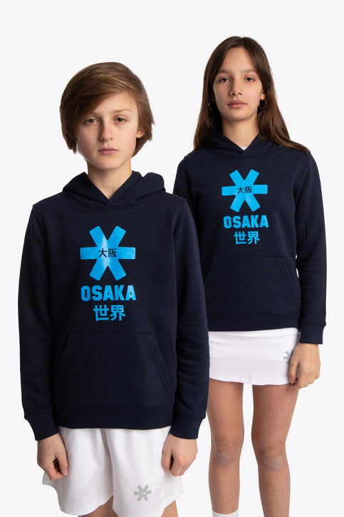 Boy and girl wearing the Osaka kids hoodie in navy with blue star logo. Front view