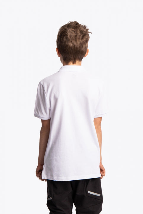Boy and girl wearing the Osaka kids polo in white with logo in black. Front view