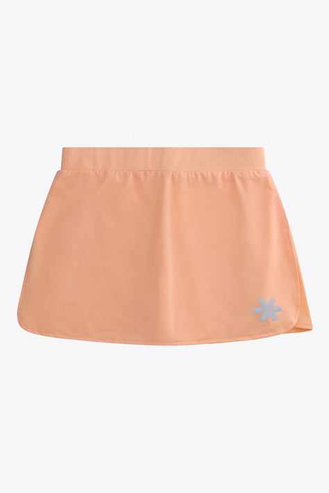 Osaka Women Ball Skort | Peach Osaka women ball skort in peach with logo in grey. Front flatlay view