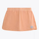 Osaka women ball skort in peach with logo in grey. Front flatlay view