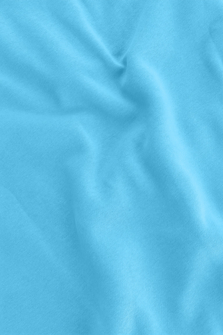 Osaka women half zip sweater in light blue with white logo. Detail fabric view