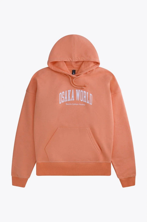Osaka Women Hoodie | Peach Osaka women hoodie in peach with white logo. Front flatlay view