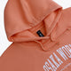 Osaka women hoodie in peach with white logo. Front flatlay logo view