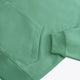 Osaka women hoodie in green with white logo. Detail sleeve flatlay view