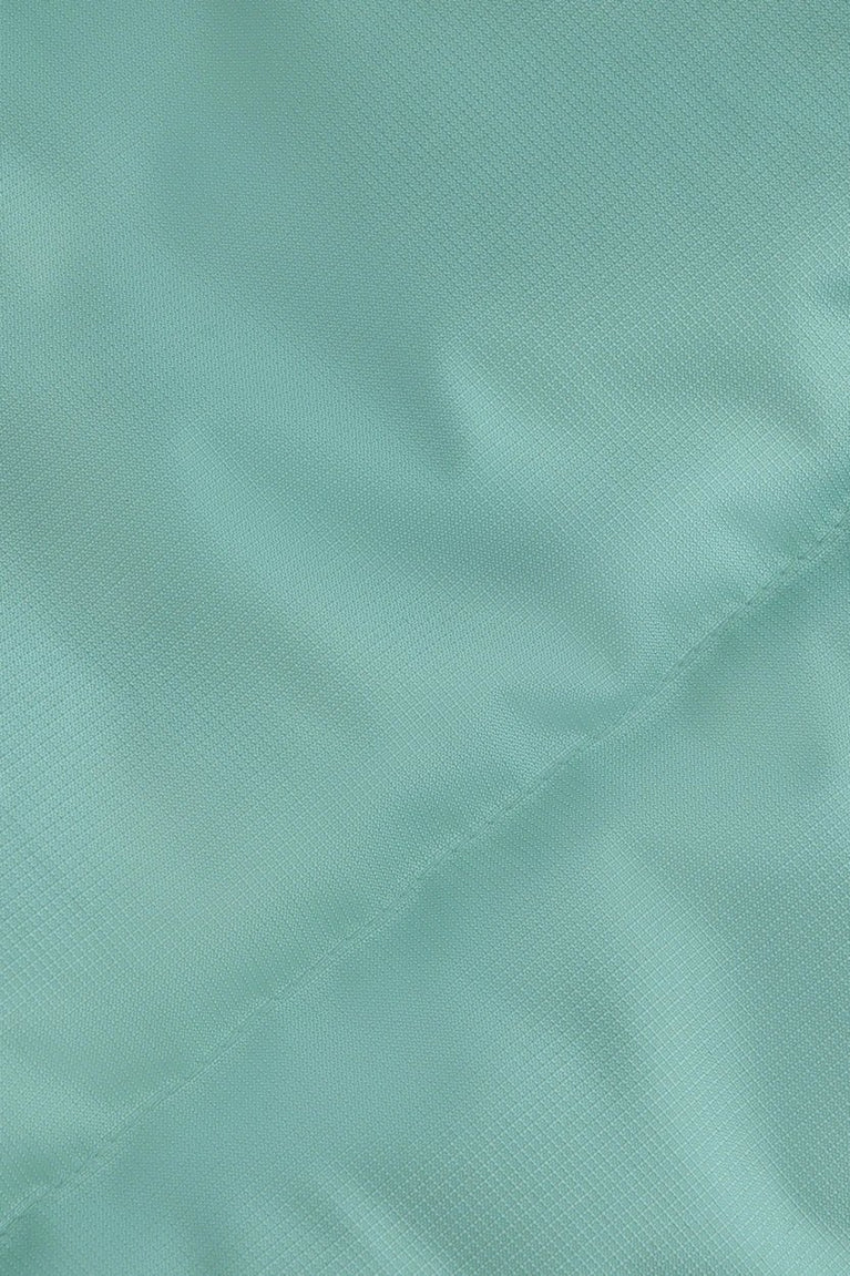 Osaka women padded gilet in green with grey logo. Detail fabric view