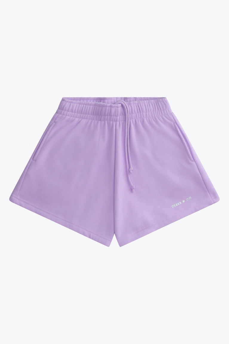 Osaka women shorts in light purple with logo in white. Front flatlay view