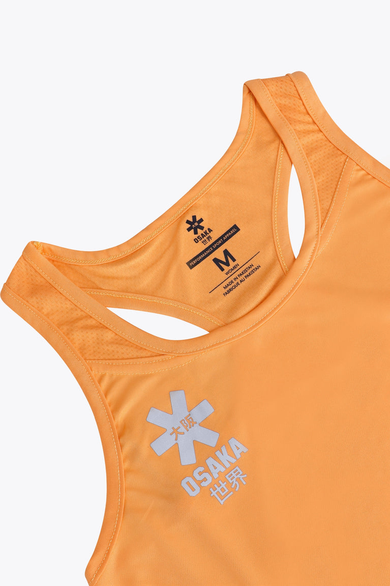 Osaka women singlet in orange with logo in grey. Front flatlay detail view