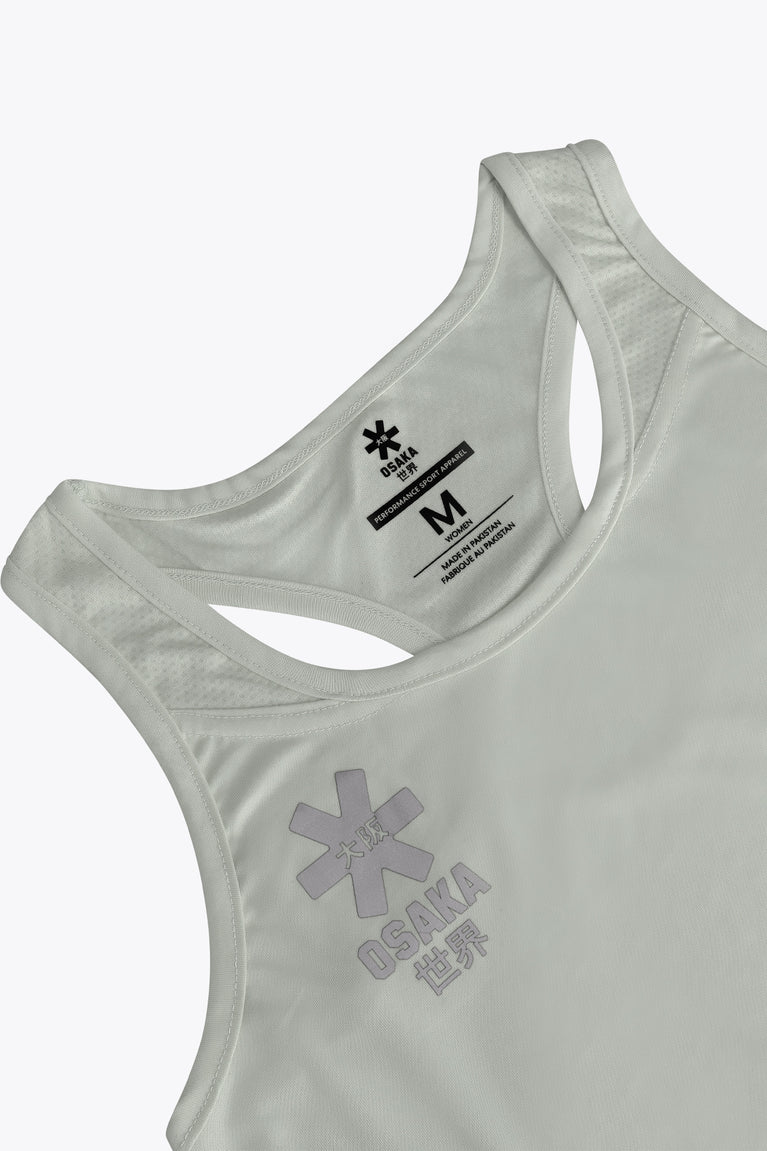 Osaka women singlet in light grey with logo in grey. Front flatlay detail view