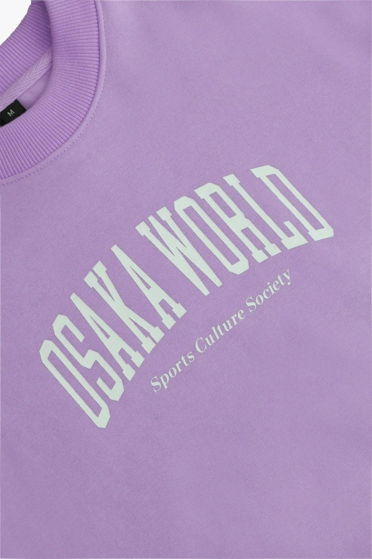 Osaka women sweater in light purple with logo in white. Front flatlay detail logo view
