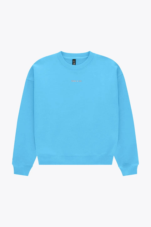 Osaka Women Sweater | Blue Topaz Osaka women sweater in light blue with logo in white. Front flatlay view