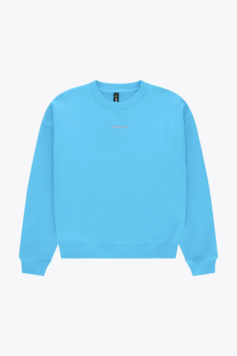 Osaka women sweater in light blue with logo in white. Front flatlay view