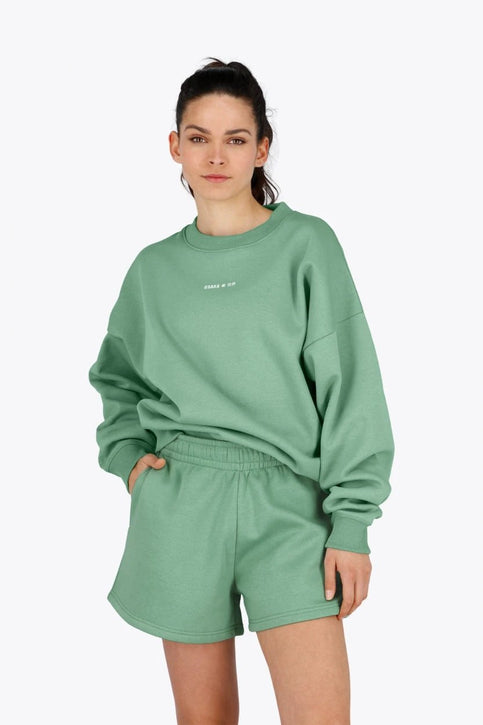 Osaka Women Sweater | Green Osaka women sweater in green with logo in white. Front flatlay view