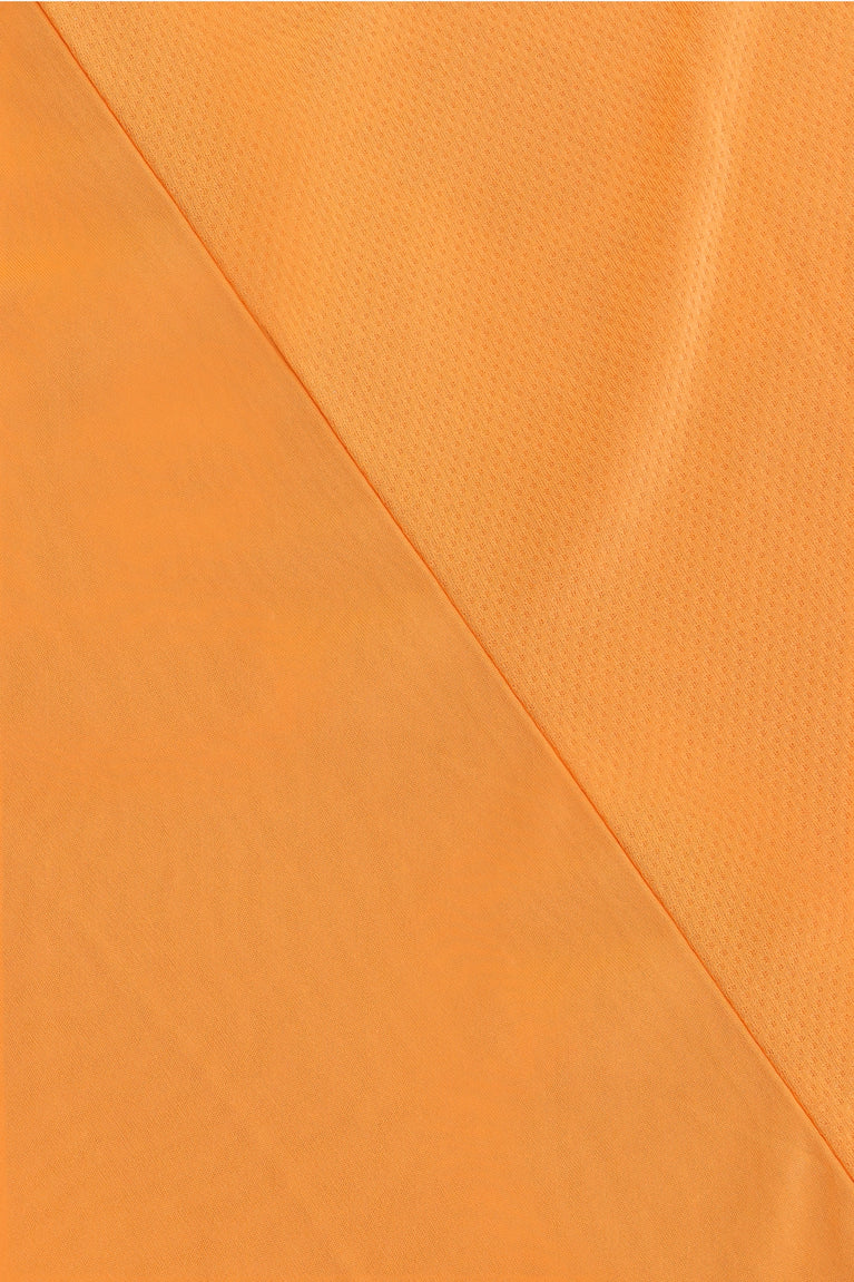 Osaka women tee short sleeve in orange with logo in grey. Detail fabric view