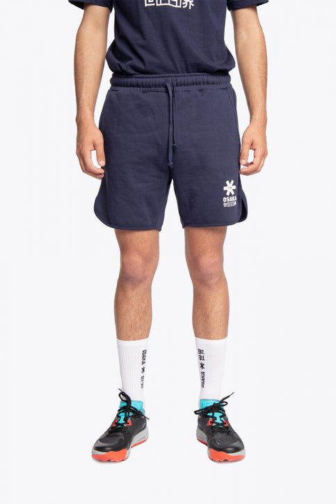 Osaka court classic short for men in navy with white logo. Front flatlay view