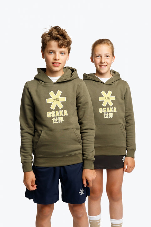 Boy and girl wearing the Osaka kids hoodie in khaki with yellow logo. Front view