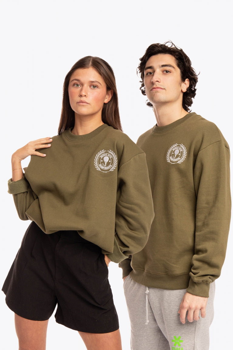 Woman and man wearing the Osaka x Buenas Open sweater in army green. Front view