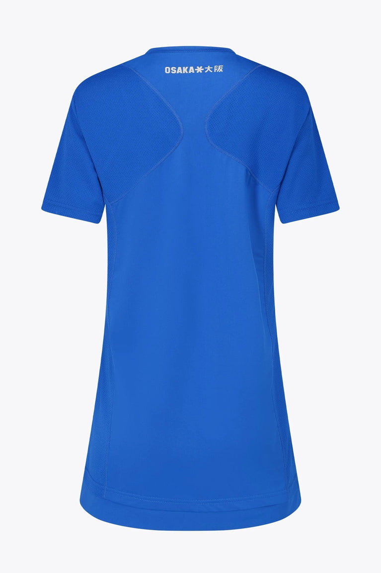 Osaka women v-neck tech dress in princess blue with logo in grey. Back flatlay view
