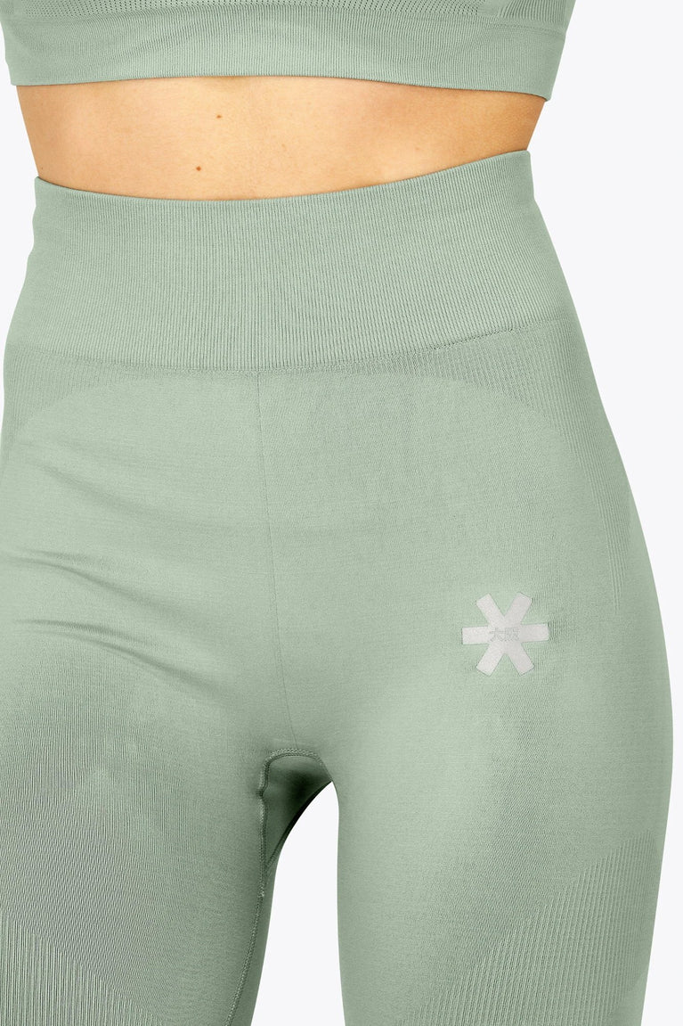 Osaka women shimuresu leggin in jadeite with logo in grey. Front detail logo view