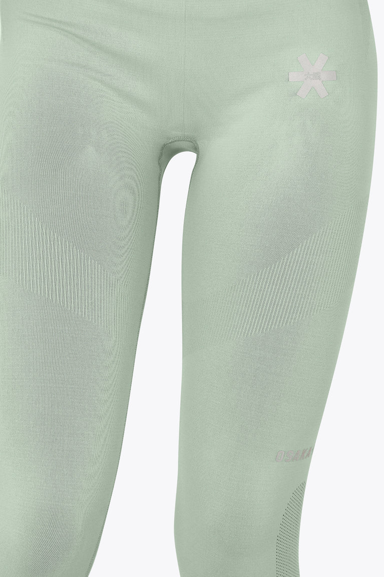 Osaka women shimuresu leggin in jadeite with logo in grey. Front detail view