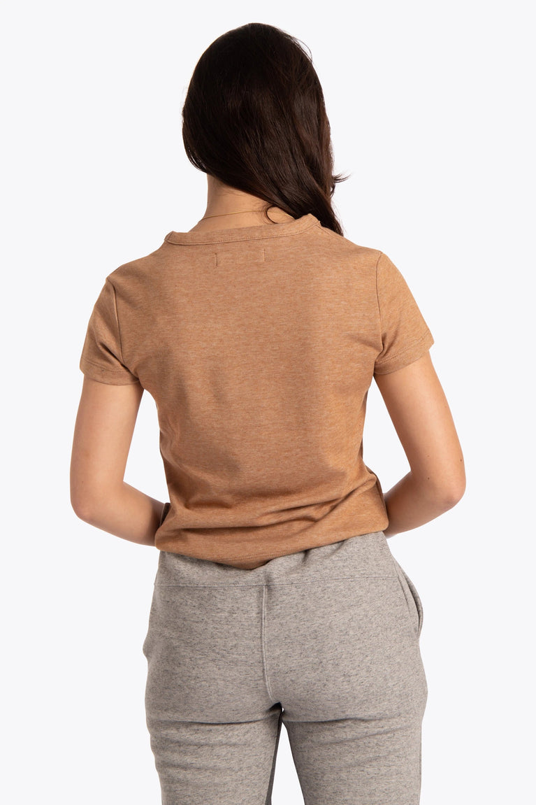 Woman wearing the Osaka women short sleeve tee in camel. Back view