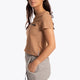 Woman wearing the Osaka women short sleeve tee in camel. Side view