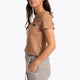 Woman wearing the Osaka women short sleeve tee in camel. Side view