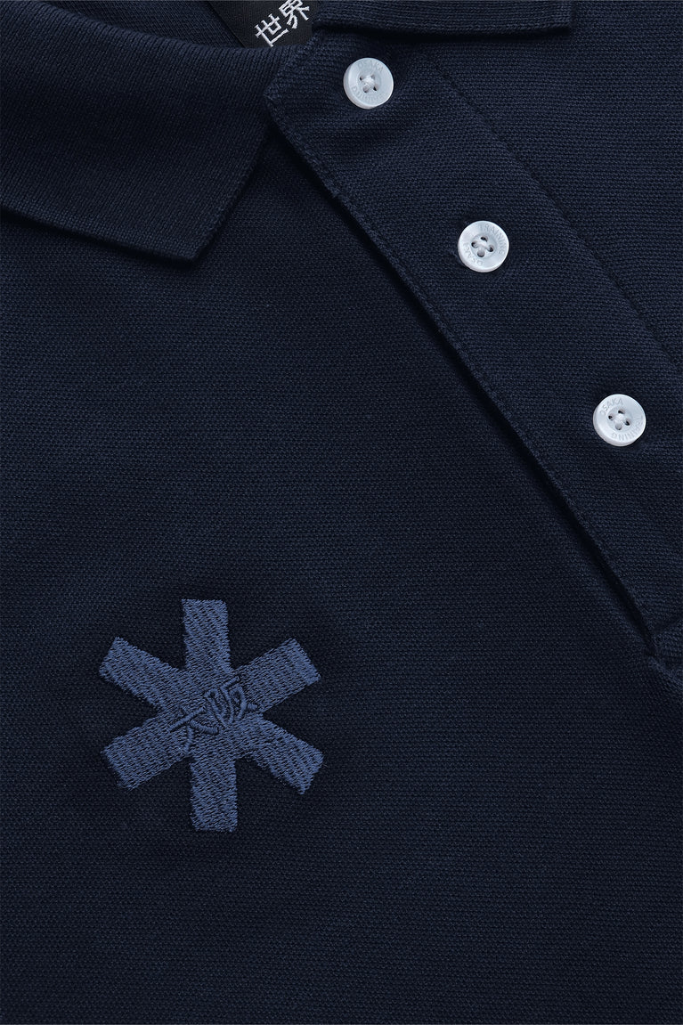 Osaka unisex basic polo in navy with navy logo. Front detail logo view