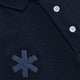 Osaka unisex basic polo in navy with navy logo. Front detail logo view
