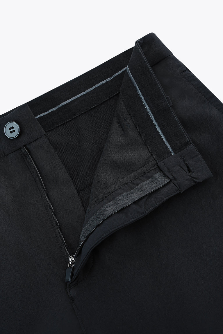 Black men’s technical golf pants with interior waistband and zip fly