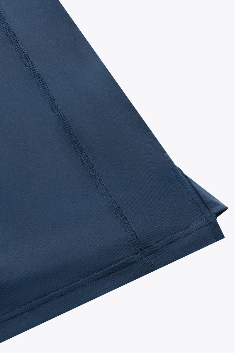 Dark blue long-sleeve tee sleeve hem with stitched seam detail