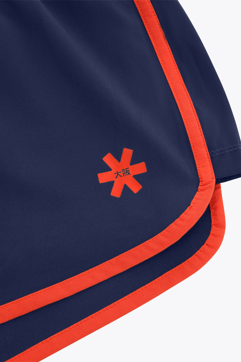 Navy short with orange side piping and red cross logo with Osaka text