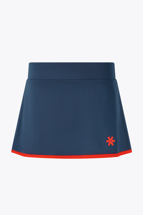 Osaka Women Floucy Skort | Olympian Women’s floucy skort by Olympian in dark navy with red hem trim and logo.