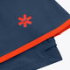 Dark navy skort with red waistband trim, stitched seams, and red starburst logo.
