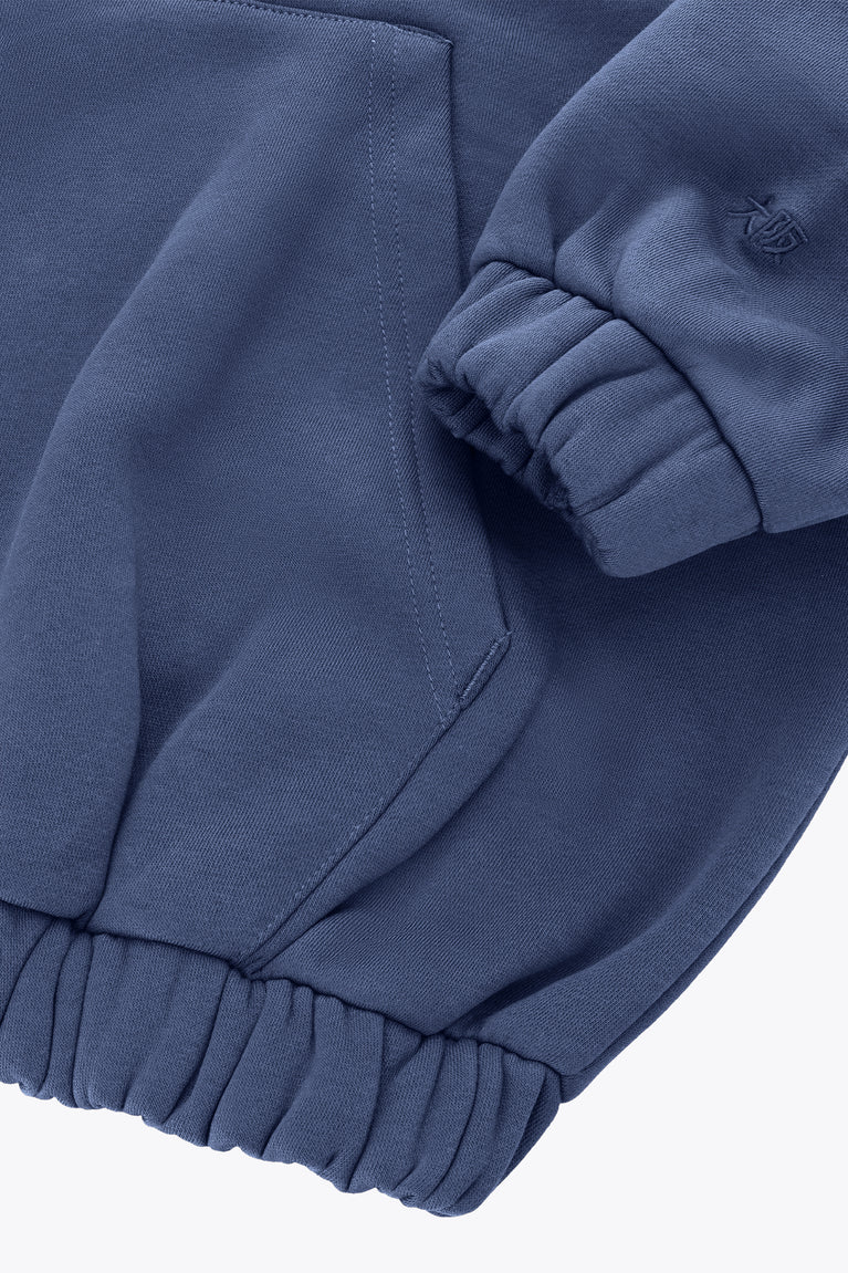 Women’s full-zip sweater sleeve cuff and front pocket, dark blue