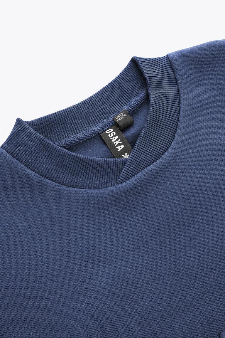 Dark blue Osaka sweater neckline with ribbed collar and inner label tag