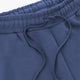 Blue sweatpants waistband with elastic and drawstring cords