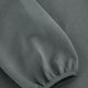 Dark grey melange unisex hoodie sleeve cuff with small embroidered emblem