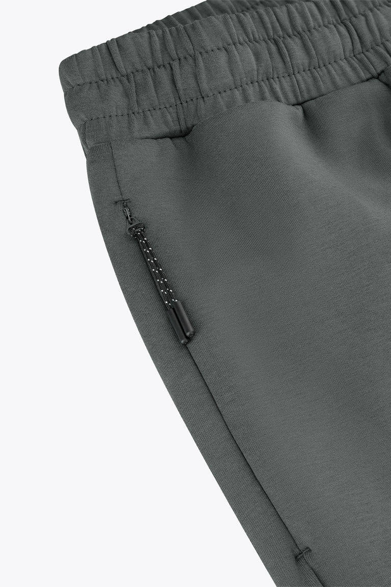 Dark grey sweatpants with zip detail on the side seam and elastic waist
