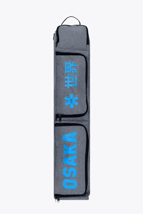 Osaka Sports Stickbag Medium | Light Grey Osaka sports stickbag medium in light grey with logo in blue. Front view