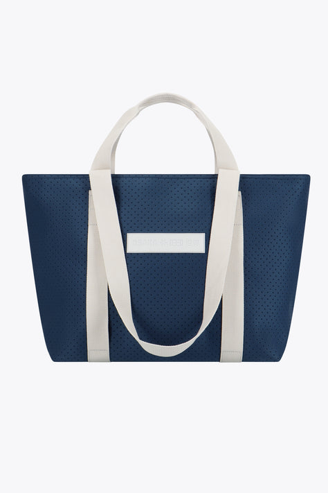 Osaka Neoprene Tote Bag | Navy Osaka neoprene Tote bag in navy with structure and logo in white. Front view
