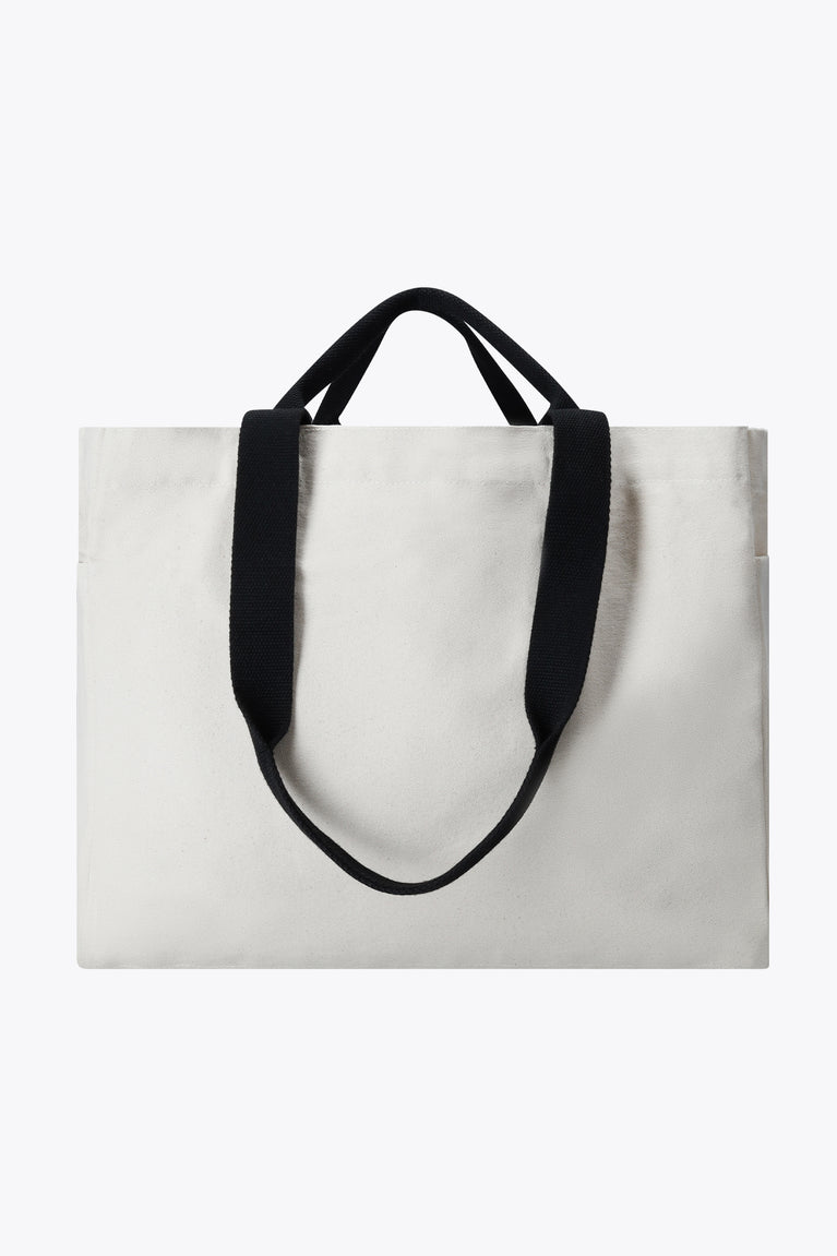 Natural raw canvas tote bag with black handles, plain front view